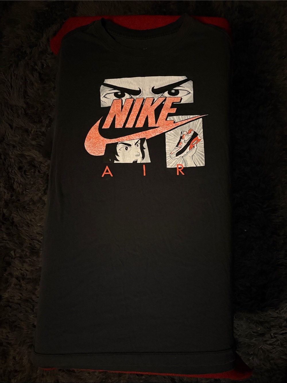 Nike Black T‑Shirt with Orange Graphic and White Accents